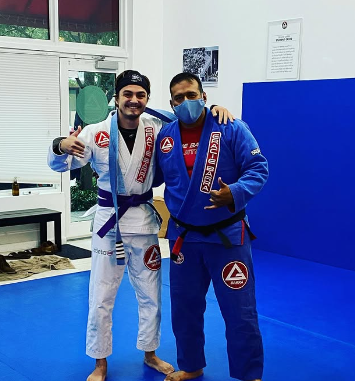 Two jiu jitsu practitioners after training at Gracie Barra