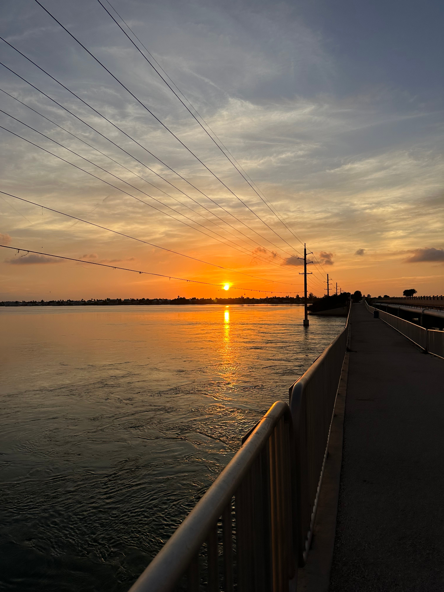 Sunset glowing over the bridge and channel